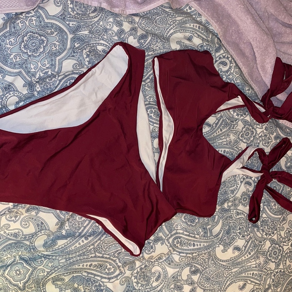 2 brand new bathing suits. Never worn all pieces are XL